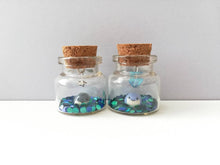 Load image into Gallery viewer, Miniature whale ornament. Little pottery whales in a glass bottle. Puffin mini ornament with or without hook