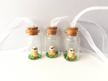 Load image into Gallery viewer, Miniature sloth ornament. Little pottery sloth decoration in a glass bottle. Christmas mini sloth ornament