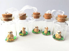 Load image into Gallery viewer, Miniature sloth ornament. Little pottery sloth decoration in a glass bottle. Christmas mini sloth ornament
