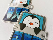 Load image into Gallery viewer, Penguin vinyl sticker, sleeping penguin sticker, sardine tin bed sticker