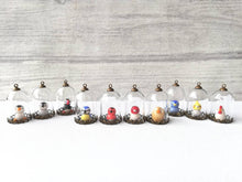 Load image into Gallery viewer, Miniature bird glass domes. Pottery penguin, owl, cockatiel, robin, blue tit, chicken, puffin, or gold finch. Mini taxidermy style.

