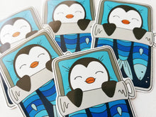 Load image into Gallery viewer, Penguin vinyl sticker, sleeping penguin sticker, sardine tin bed sticker