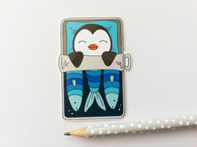 Load image into Gallery viewer, Penguin vinyl sticker, sleeping penguin sticker, sardine tin bed sticker
