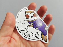 Load image into Gallery viewer, Sloth vinyl sticker, sleeping sloth sticker, snooze on a moon sticker, purple or blue