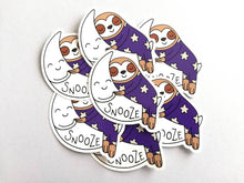 Load image into Gallery viewer, Sloth vinyl sticker, sleeping sloth sticker, snooze on a moon sticker, purple or blue