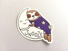 Load image into Gallery viewer, Sloth vinyl sticker, sleeping sloth sticker, snooze on a moon sticker, purple or blue