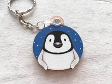 Load image into Gallery viewer, Penguin chick keyring. Wooden key fob, blue starry night, penguin key chain, wood bag charm, responsibly resourced wood