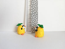 Load image into Gallery viewer, Penguin pineapple. Little penguin in a box, black and white miniature pottery penguin in a yellow pineapple, ceramic quirky penguin gift