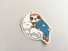 Load image into Gallery viewer, Sloth vinyl sticker, sleeping sloth sticker, snooze on a moon sticker, purple or blue