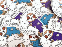 Load image into Gallery viewer, Sloth vinyl sticker, sleeping sloth sticker, snooze on a moon sticker, purple or blue
