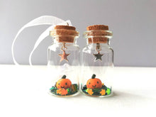 Load image into Gallery viewer, Miniature pumpkin decoration. Little pottery pumpkin in a glass bottle. Halloween mini star autumn ornament
