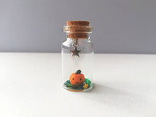 Load image into Gallery viewer, Miniature pumpkin decoration. Little pottery pumpkin in a glass bottle. Halloween mini star autumn ornament
