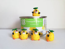 Load image into Gallery viewer, Penguin pineapple. Little penguin in a box, black and white miniature pottery penguin in a yellow pineapple, ceramic quirky penguin gift