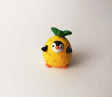 Load image into Gallery viewer, Penguin pineapple. Little penguin in a box, black and white miniature pottery penguin in a yellow pineapple, ceramic quirky penguin gift