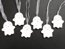 Load image into Gallery viewer, Pottery ghost hanger. Little happy ghost tag. Hand painted ceramics, Halloween ornament
