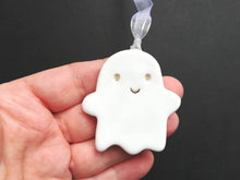 Load image into Gallery viewer, Pottery ghost hanger. Little happy ghost tag. Hand painted ceramics, Halloween ornament