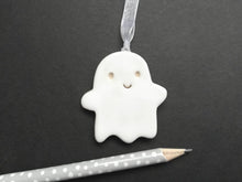 Load image into Gallery viewer, Pottery ghost hanger. Little happy ghost tag. Hand painted ceramics, Halloween ornament