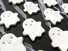 Load image into Gallery viewer, Pottery ghost hanger. Little happy ghost tag. Hand painted ceramics, Halloween ornament