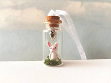 Load image into Gallery viewer, Miniature rabbit decoration. Little pottery white rabbit in a glass bottle. Mini bunny ornament and silver heart. Easter tree
