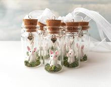Load image into Gallery viewer, Miniature rabbit decoration. Little pottery white rabbit in a glass bottle. Mini bunny ornament and silver heart. Easter tree