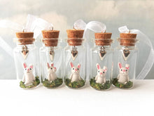 Load image into Gallery viewer, Miniature rabbit decoration. Little pottery white rabbit in a glass bottle. Mini bunny ornament and silver heart. Easter tree