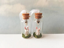 Load image into Gallery viewer, Miniature rabbit decoration. Little pottery white rabbit in a glass bottle. Mini bunny ornament and silver heart. Easter tree