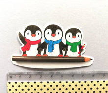 Load image into Gallery viewer, Penguins and pencil sticker, artist, writer penguin sticker, eco friendly sticker
