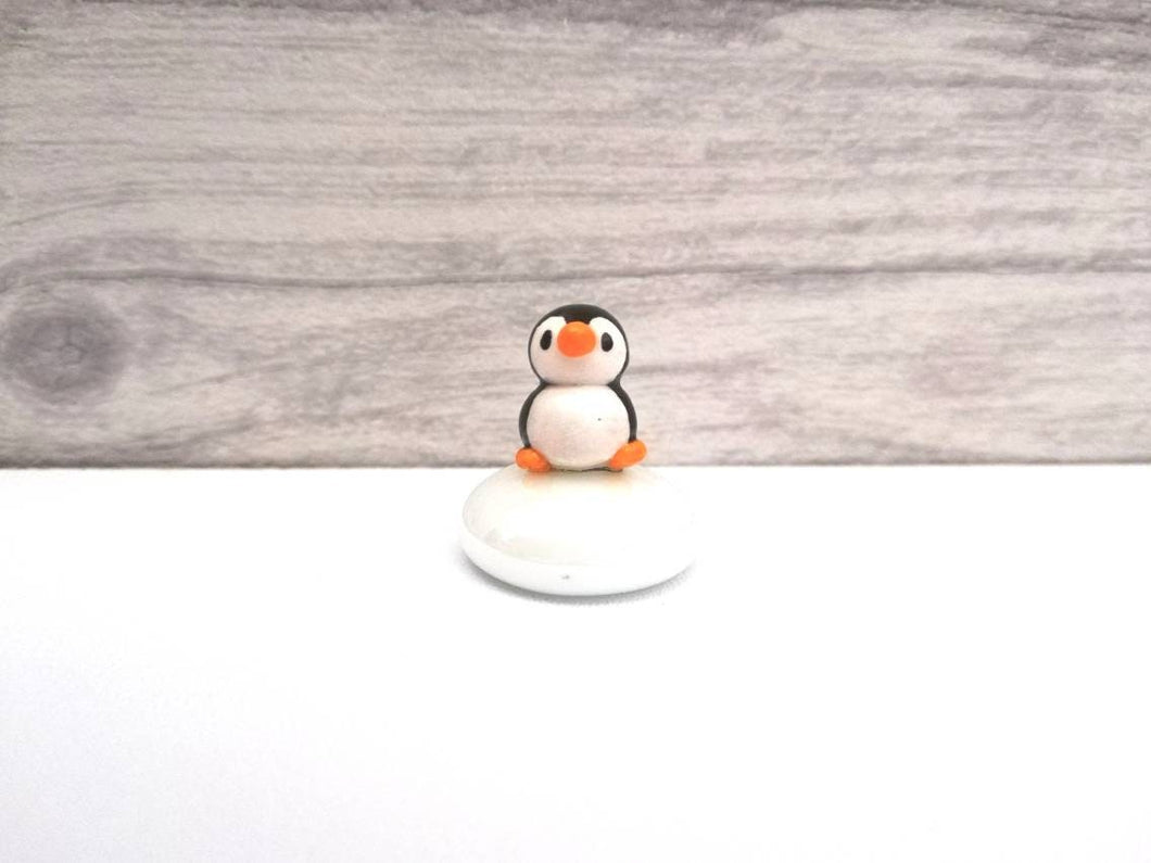 Miniature penguins, puffins and seals. Pottery and glass tiny ornament. Cute mini penguin, puffin or seal.