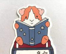Load image into Gallery viewer, Guinea pig sticker, book lover, reading cavy vinyl star decal
