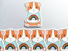 Load image into Gallery viewer, Guinea pig in a rainbow jumper,  rainbow and cloud blue sticker
