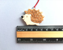 Load image into Gallery viewer, Pottery hedgehog hanger. Little hedgehog tag. Hand painted ceramics, hogs and kisses