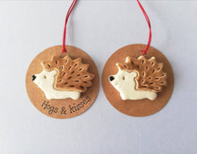 Load image into Gallery viewer, Pottery hedgehog hanger. Little hedgehog tag. Hand painted ceramics, hogs and kisses