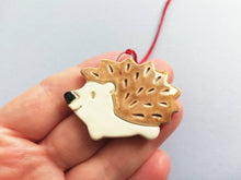 Load image into Gallery viewer, Pottery hedgehog hanger. Little hedgehog tag. Hand painted ceramics, hogs and kisses
