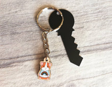 Load image into Gallery viewer, Little guinea pig keyring, cute mini piggy, rainbow jumper wooden key chain, ethically sourced wood, eco friendly charm