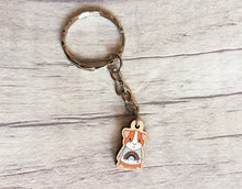 Load image into Gallery viewer, Little guinea pig keyring, cute mini piggy, rainbow jumper wooden key chain, ethically sourced wood, eco friendly charm
