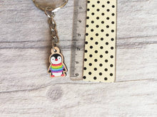 Load image into Gallery viewer, Little penguin keyring, cute rainbow mini tag, wooden key chain, penguin wearing a jumper, ethically sourced wood, eco friendly charm