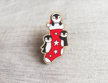 Load image into Gallery viewer, Christmas stocking pin, penguin wooden pin brooch, Responsibly resourced wood, eco friendly. Christmas penguins stocking filler