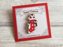 Load image into Gallery viewer, Christmas stocking pin, penguin wooden pin brooch, Responsibly resourced wood, eco friendly. Christmas penguins stocking filler