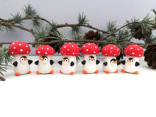 Load image into Gallery viewer, Toadstool penguin. Little penguin in a box, autumn miniature pottery penguin in a red and white mushroom, ceramic quirky Halloween gift