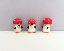 Load image into Gallery viewer, Toadstool penguin. Little penguin in a box, autumn miniature pottery penguin in a red and white mushroom, ceramic quirky Halloween gift