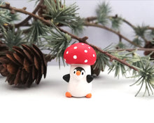 Load image into Gallery viewer, Toadstool penguin. Little penguin in a box, autumn miniature pottery penguin in a red and white mushroom, ceramic quirky Halloween gift