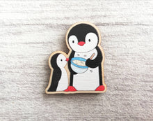 Load image into Gallery viewer, Kitchen penguin magnet set, little chef, baking, cooking, aprons, cake, wooden fridge magnet. Eco friendly responsibly sourced wood