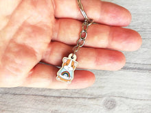 Load image into Gallery viewer, Little guinea pig keyring, cute mini piggy, rainbow jumper wooden key chain, ethically sourced wood, eco friendly charm