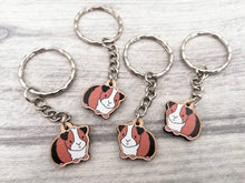 Load image into Gallery viewer, Mini guinea pig keyring, small cavy wooden key fob, ethically sourced wood, tri colour guinea pig key chain, bag charm
