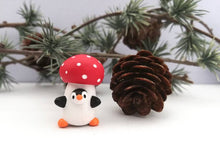 Load image into Gallery viewer, Toadstool penguin. Little penguin in a box, autumn miniature pottery penguin in a red and white mushroom, ceramic quirky Halloween gift