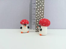 Load image into Gallery viewer, Toadstool penguin. Little penguin in a box, autumn miniature pottery penguin in a red and white mushroom, ceramic quirky Halloween gift