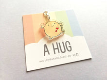 Load image into Gallery viewer, A hug stitch marker, cute positive charm, friendship, postable hug, supportive, recycled acrylic