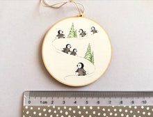 Load image into Gallery viewer, Little wooden penguin decoration. Playing in the snow Christmas ornament, eco friendly wood. Penguin chicks