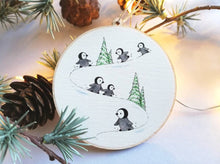 Load image into Gallery viewer, Little wooden penguin decoration. Playing in the snow Christmas ornament, eco friendly wood. Penguin chicks