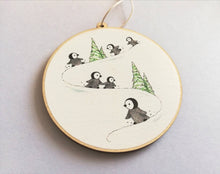 Load image into Gallery viewer, Little wooden penguin decoration. Playing in the snow Christmas ornament, eco friendly wood. Penguin chicks